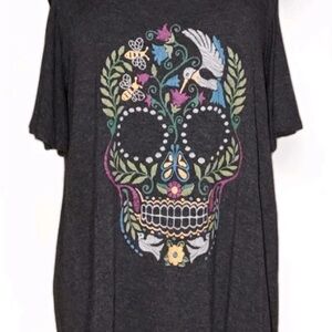 Oversized Torrid cold shoulder top fits like a 1/2, Actual size is 00